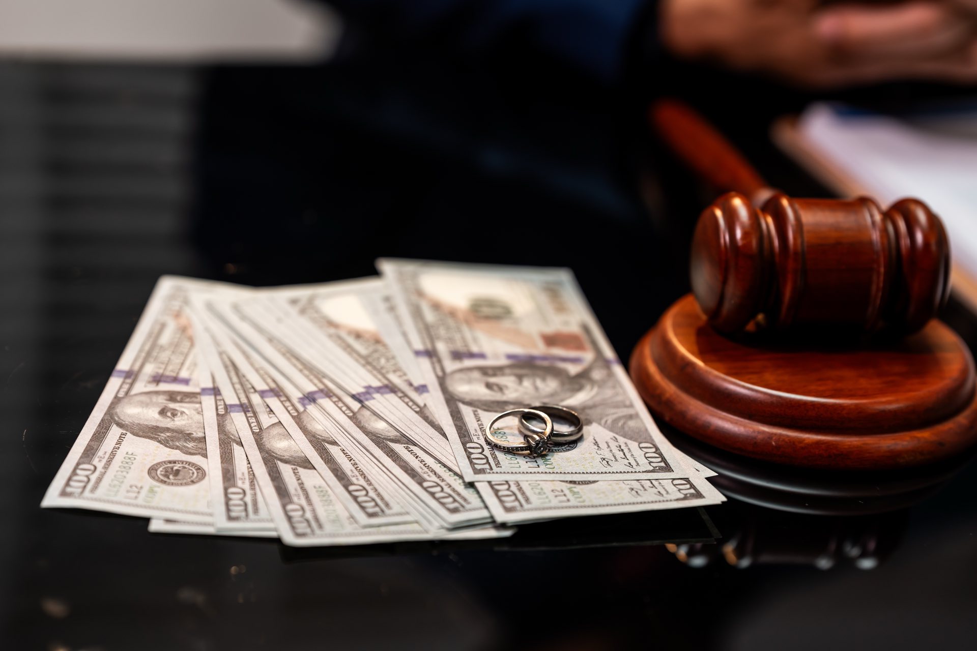Money with a gavel and rings